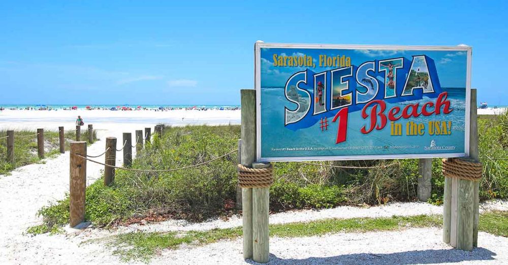 Siesta Key Beach with sign